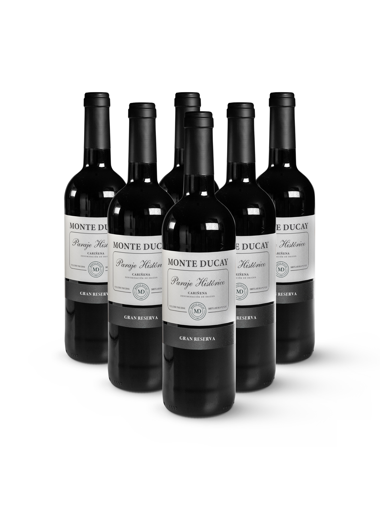 Rotwein Monte Ducay Gran Reserva in 6 eleganten Flaschen mit goldrotem Etikett auf weißem Hintergrund